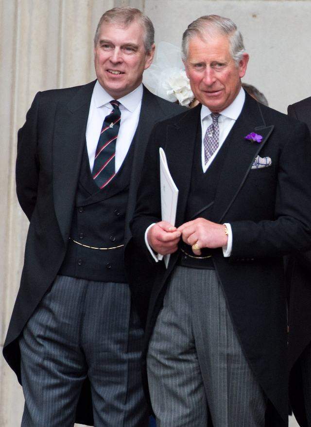 EL príncipe Andrés y el rey Carlos III.