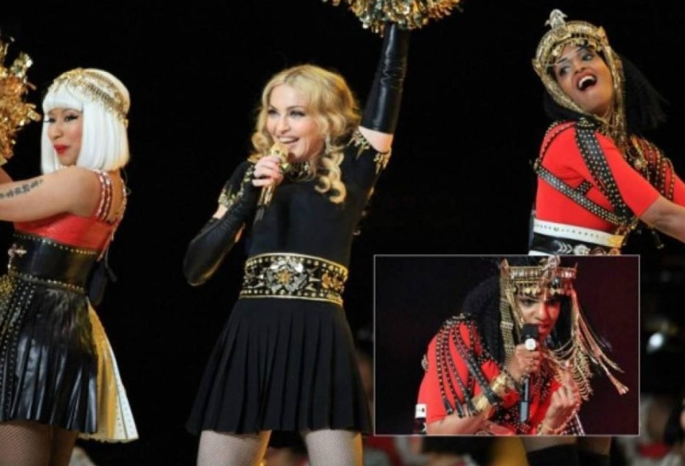 En 2012, Madonna apareció en el escenario montado por la NFL junto a Nicki Minaj y M.I.A., quien fue demandada por hacer una seña obscena en la transmisión en vivo.