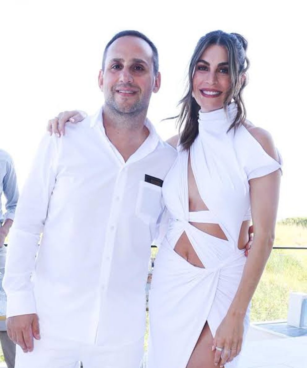 Michael Rubin y Camille Fisher en su fiesta anual del 4 de julio.