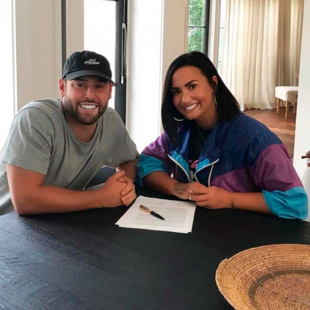 Demi Lovato terminó su relación laboral con Scooter Braun el mismo día que Ariana Grande.