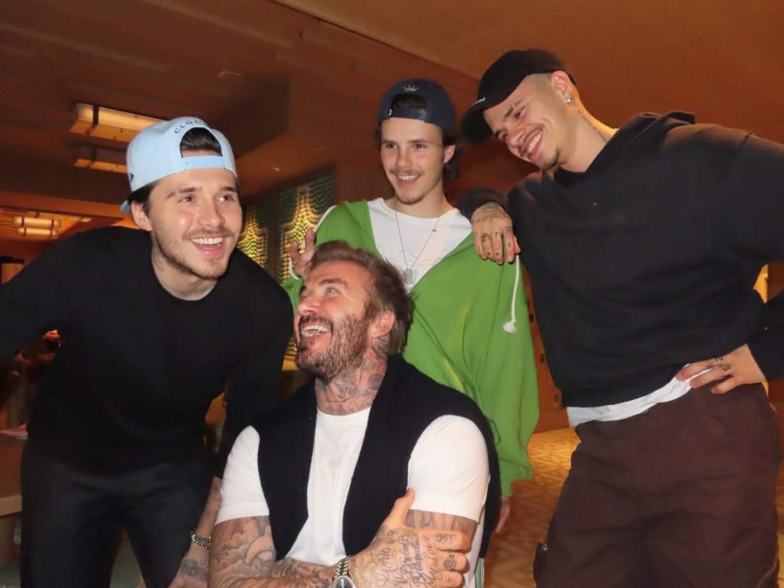 Brooklyn, Romeo, Cruz y David Beckham.